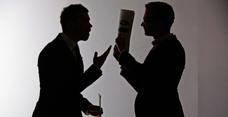 Streit kann entstehen, wenn Arbeitskollegen unterschiedlichen Persönlichkeitstypen angehören.